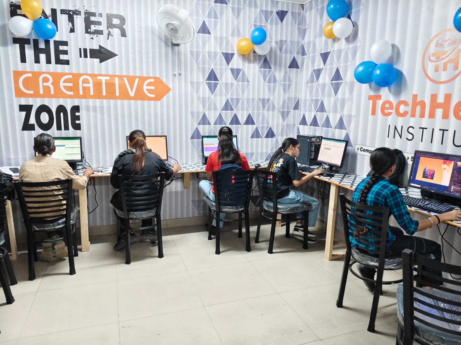 TechHeads Institute Students Practicing Computer Skills